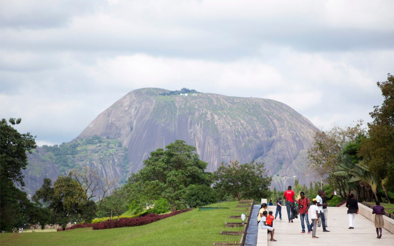 Abuja, Nigeria - September 6, 2015: People walking in Millennium park, the largest park of Nigeria's capital city.